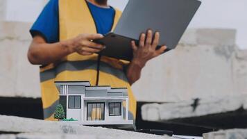 Construction worker, tablet and portrait of man with research and digital data for solar panel installation. Happy, engineer and male contractor with eco and energy project with tech and online plan video