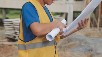 Construction worker, tablet and portrait of man with research and digital data for solar panel installation. Happy, engineer and male contractor with eco and energy project with tech and online plan video