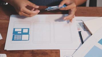 Woman designer create website design wireframe. Sketch, prototype, framework, layout future design project. UI and UX - user interface, user experience designer. Creative concept for web design studio video