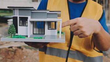 Construction worker, tablet and portrait of man with research and digital data for solar panel installation. Happy, engineer and male contractor with eco and energy project with tech and online plan video