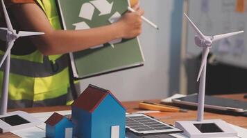 Selective focus, Asian female architect or engineer Drawing the design of the building's interior using a tablet. Asian female architect or engineer Sit and analyze, design projects in the office. video