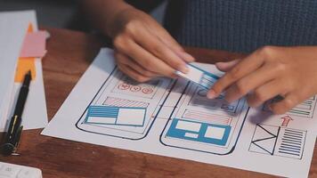 Woman designer create website design wireframe. Sketch, prototype, framework, layout future design project. UI and UX - user interface, user experience designer. Creative concept for web design studio video