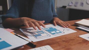 Woman designer create website design wireframe. Sketch, prototype, framework, layout future design project. UI and UX - user interface, user experience designer. Creative concept for web design studio video