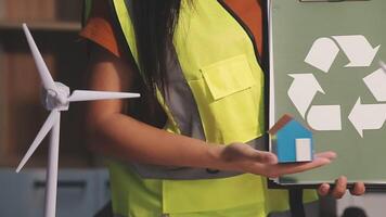 Selective focus, Asian female architect or engineer Drawing the design of the building's interior using a tablet. Asian female architect or engineer Sit and analyze, design projects in the office. video