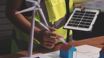 Selective focus, Asian female architect or engineer Drawing the design of the building's interior using a tablet. Asian female architect or engineer Sit and analyze, design projects in the office. video
