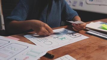 Woman designer create website design wireframe. Sketch, prototype, framework, layout future design project. UI and UX - user interface, user experience designer. Creative concept for web design studio video