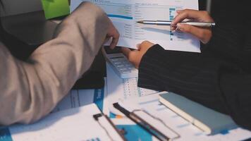 Finance manager meeting discussing company growth project success financial statistics, professional investor working start up project for strategy plan with document, laptop and digital tablet. video