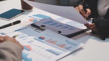 Finance manager meeting discussing company growth project success financial statistics, professional investor working start up project for strategy plan with document, laptop and digital tablet. video