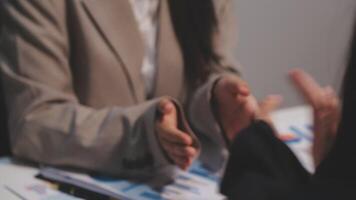 Finance manager meeting discussing company growth project success financial statistics, professional investor working start up project for strategy plan with document, laptop and digital tablet. video