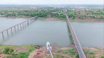 Aerial view of two bridge over a wide river video