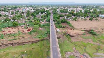 Aerial view of highway bridge on creek video