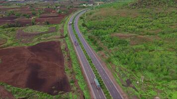 Aerial view of curve highway with vehicles video