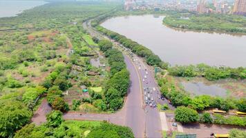 Aerial view of highway and large lake video