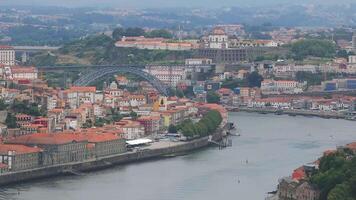 Aerial view of the European city Porto with Luis I Bridge over Douro river in Portugal, aerial view. Panoramic aerial view of Dom Luis Bridge in Porto video