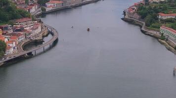 Aerial view of the European city Porto with Luis I Bridge over Douro river in Portugal, aerial view. Panoramic aerial view of Dom Luis Bridge in Porto video