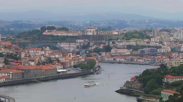 Aerial view of the European city Porto with Luis I Bridge over Douro river in Portugal, aerial view. Panoramic aerial view of Dom Luis Bridge in Porto video