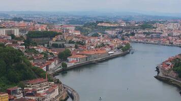 Aerial view of the European city Porto with Luis I Bridge over Douro river in Portugal, aerial view. Panoramic aerial view of Dom Luis Bridge in Porto video