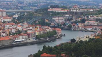 Aerial view of the European city Porto with Luis I Bridge over Douro river in Portugal, aerial view. Panoramic aerial view of Dom Luis Bridge in Porto video