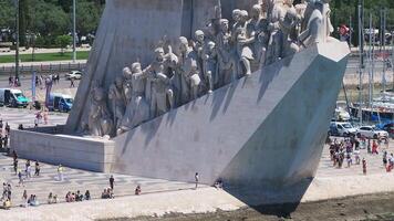 Aerial close up of the both sides of the monument to the Discoveries at Belem district. Monument of Discoveries in the Tagus River located where ships departed to explore in the Age of Discovery. video
