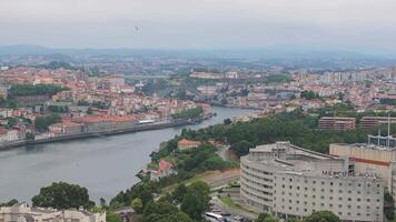Aerial view of the European city Porto with Luis I Bridge over Douro river in Portugal, aerial view. Panoramic aerial view of Dom Luis Bridge in Porto video