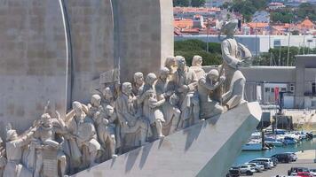 Aerial close up of the both sides of the monument to the Discoveries at Belem district. Monument of Discoveries in the Tagus River located where ships departed to explore in the Age of Discovery. video