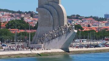 Aerial close up of the both sides of the monument to the Discoveries at Belem district. Monument of Discoveries in the Tagus River located where ships departed to explore in the Age of Discovery. video