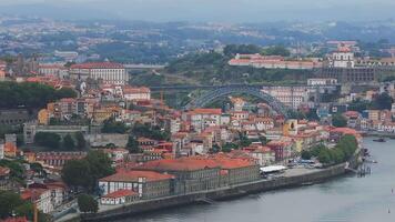 Aerial view of the European city Porto with Luis I Bridge over Douro river in Portugal, aerial view. Panoramic aerial view of Dom Luis Bridge in Porto video