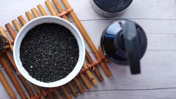 Black Cumin seed in a bowl on table video