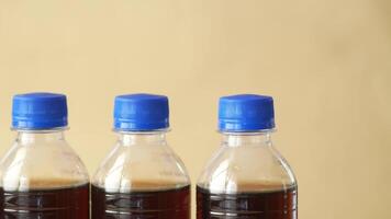 plastic bottles of soft drink on table video