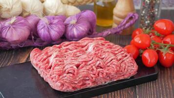 top view of beef mince and fresh vegetables on table video