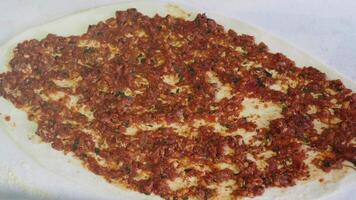 Turkish flatbread with spicy minced meat is a delicious dish with traditional flavors video