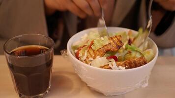 Enjoy a nutritious dish of Grilled Chicken Salad paired with a refreshing drink video