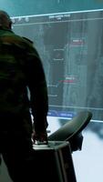 Vertical Officer managing surveillance cctv system with data analysis and processing, gathering real time intelligence for strategic military operations. Successful secret service defense mission. Camera A. video