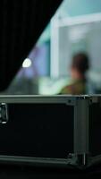 Vertical Military personnel in a high tech control room gathers intelligence for data integration in defense operations, processing real time surveillance systems. Support troops in field missions. Camera B. video
