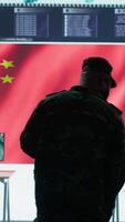 Vertical American army working in a command post with green screen, soldiers examining satellite imagery for clues regarding a national safety operation. US military control tower for surveillance. Camera A. video