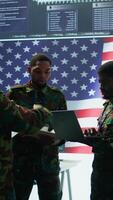 Vertical Government intelligence officers in control room manage surveillance operations, analyze real time data and coordinate security measures to protect national interests. Secret service. Camera A. video