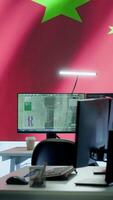 Vertical Empty monitoring room equipped with the chinese flag on big screen using surveillance satellite systems to spread fake news about communism. Work on propaganda and terrorism. Camera A. video
