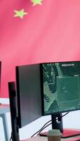 Vertical Empty chinese army power base control room using radar cctv to monitor terrorist attacks and warfare activities. Spreading fake news through communism ideology in military command post. Camera A. video