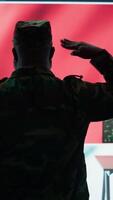 Vertical American army working in a command post with green screen, soldiers examining satellite imagery for clues regarding a national safety operation. US military control tower for surveillance. Camera A. video