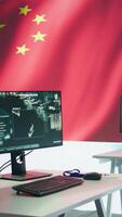 Vertical Military base of operations for the chinese government employed to spread misinformation about warfare tactics, fighting for communism ideology worldwide. Empty control center. Camera B. video