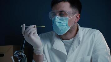 Lab worker injecting medication into meat sample. Genetically modified meat. Artificial meat product, food technology of future. GMO food concept. Male nutrition expert testing food products in lab. video