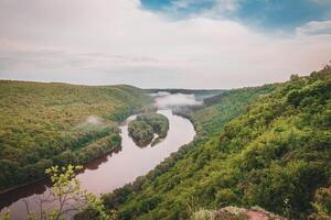 View of the Dniester Canyon from the top with beautiful clouds photo