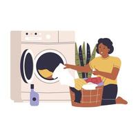 Flat design of woman washing dirty clothes using a machine vector