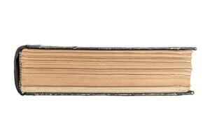 bottom view of a closed book - page edges of an old closed book, isolated on white background with clipping path photo