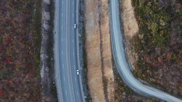 Bypass road in Vladivostok. Highway among the mountains in the evening video