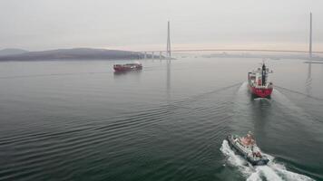 Drone view of the a pilot boat and multipurpose vessel Shantar in motion video