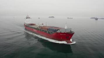 Aerial view of the a container ship in motion video
