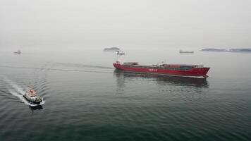Drone view of the a pilot boat and multipurpose vessel Shantar in motion video