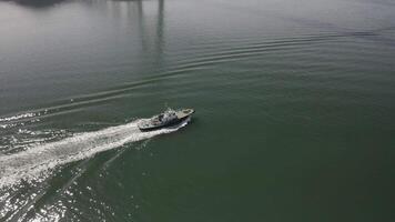 Tugboat activity from above. A bird's eye view from a drone video