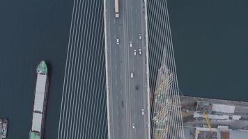 View from a drone vertically down to the Golden Bridge and the city video